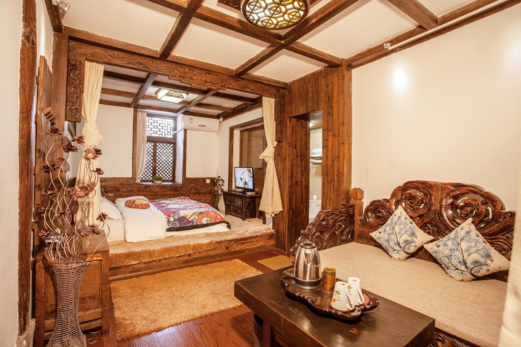 XI Tang Exquisite Hotel Λιγιάνγκ Δωμάτιο φωτογραφία