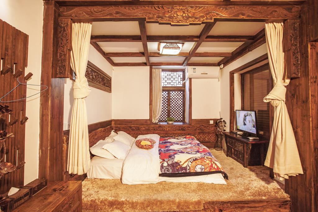 XI Tang Exquisite Hotel Λιγιάνγκ Δωμάτιο φωτογραφία